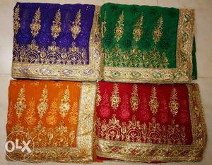 Purple, Red, Green, And Orange Textiles