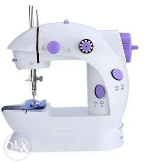 White And Purple Sewing Machine