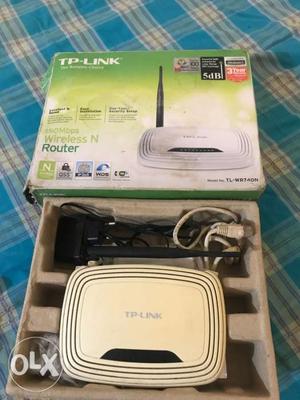 White TP-Link Router With Box