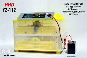 Yellow And Clear Plastic Egg Incubator With Text Overlay