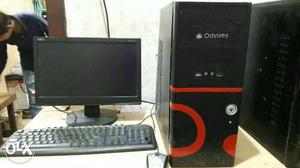 Black Computer Monitor, Keyboard, And Tower