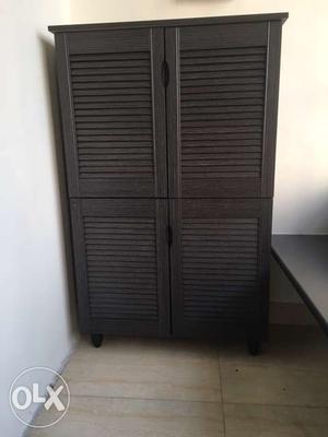 Hardly used Four Door Shoe Cabinet