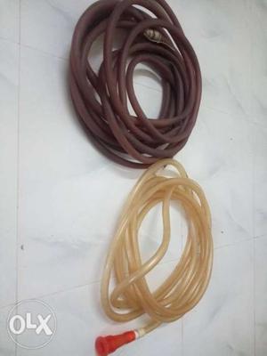 Two Brown Rubber pipe