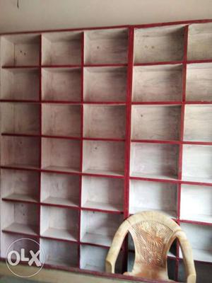White And Red Wooden Shelves