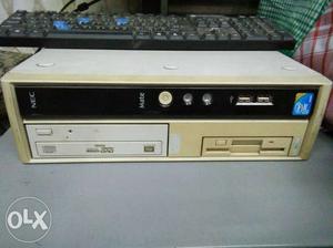 Beige And Black NEC Computer Tower