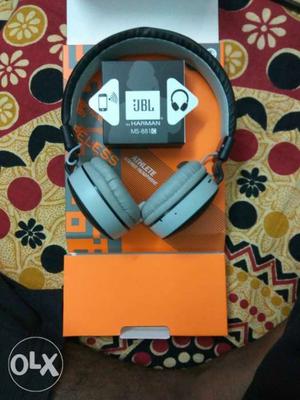 Gray And Black JBL Headphones With Box
