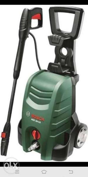 Green And Black Bissell Upright Vacuum Cleaner