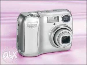 Silver Nikon COOLPIX  Point-and-shoot Camera