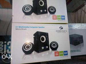 Two Black Zebronics 2.1 Speaker Boxes