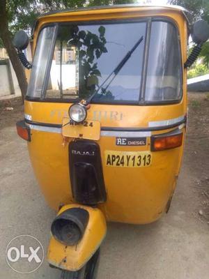 Yellow Bajaj Auto Rickshaw