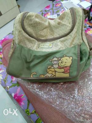 Baby's Green And Pink Carrier