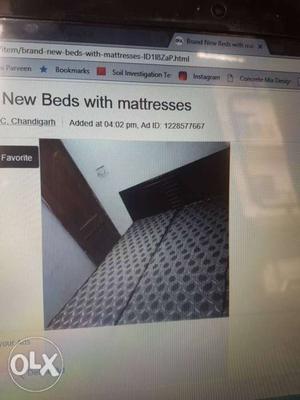 Black And Gray Beds With Mattresses Screengrab