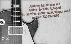 Black And White Electric Guitar With Text Overlay