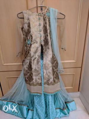 Chanya choli with sherwani style top and also a