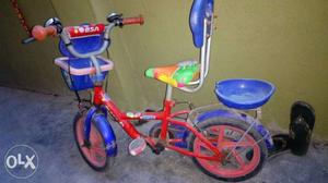 Kids cycle with support wheels in good condition