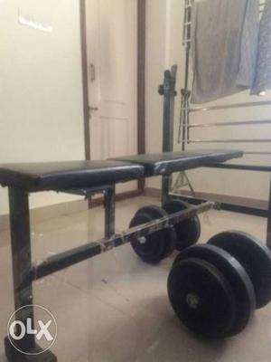 Multi gym bench with 50 kg weights & straight and