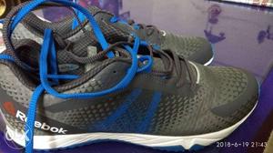 Pair Of Gray-and-blue Running Shoes