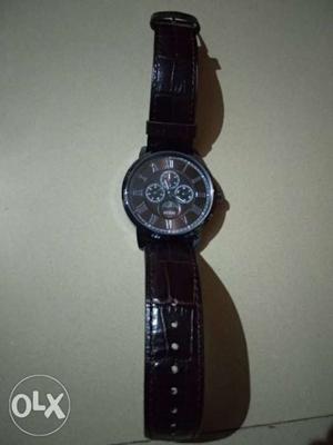 Round Brown Chronograph Watch With Brown Leather Strap not