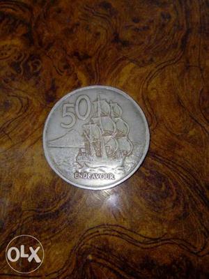 Round Silver-colored 50 Endeavour Coin