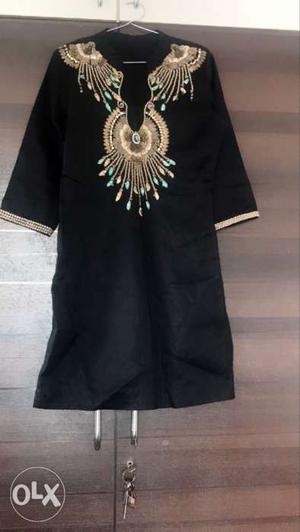 Short kurti dress with beautiful antique work on