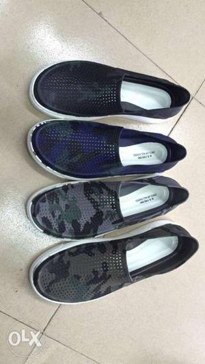 Three Pairs Of Black And Blue Low-top Sneakers