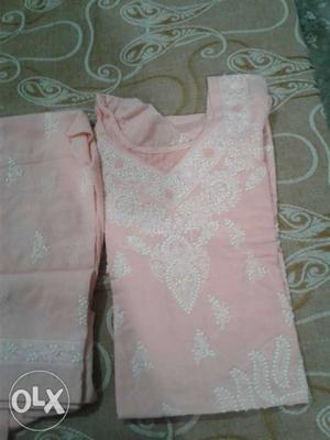 White And Pink Floral Textile