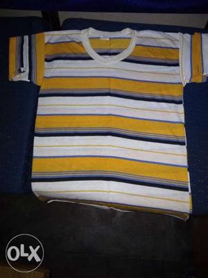 White, Yellow, And Blue Striped Textile