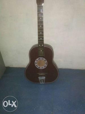 Acoustic guitar for beginners..with capo and bag