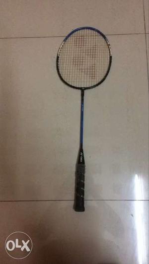 Black And Beige Badminton Racket