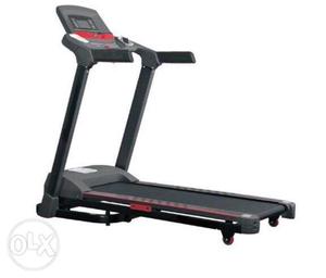 Black And Gray Automatic Treadmill