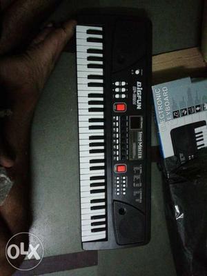 Black And White Digfun Electronic Keyboard