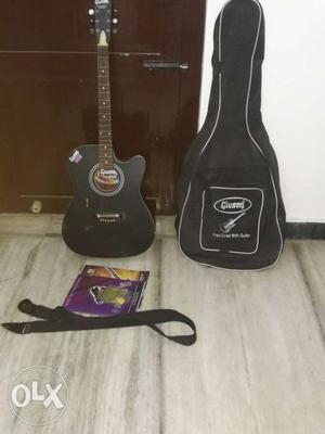 Black Cutaway Guitar And Gig Case