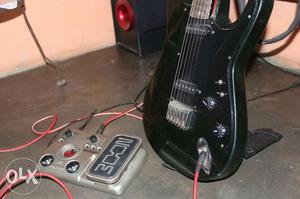 Black Electric Guitar and Processor