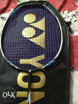 Black, Gray, And Blue Badminton Racket