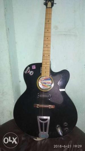 Black colour semi electric guitar without bag
