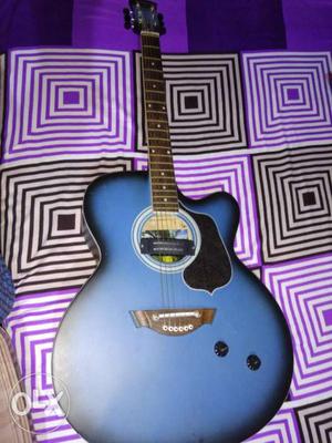 Clapton acoustic guitar in new condition 3 months