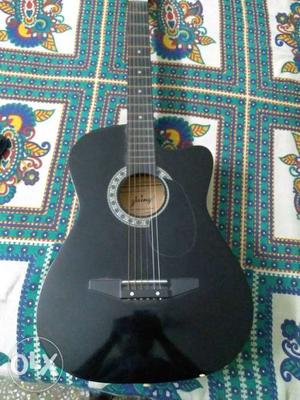 Guitar 38 inches with new extra strings and bag