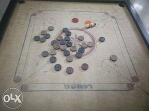Nice conditions carrom board, with full coins