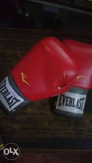 Pair Of Red-and-gray Everlast Boxing Gloves