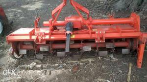 Red And Gray Cultivator