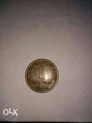 Round  Gold-colored 1 Indian Paise Coin