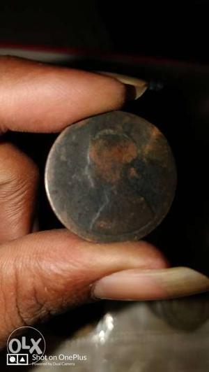 Round Silver-colored Coin