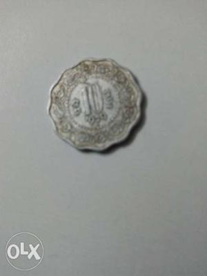 Silver-colored 10 Indian Paice Coin