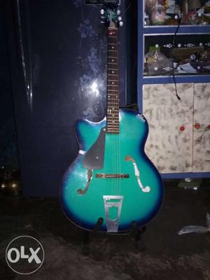 Teal And Blue Jazz Guitar