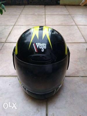 Vega Helmet Yellow and Black colour 1 year old.