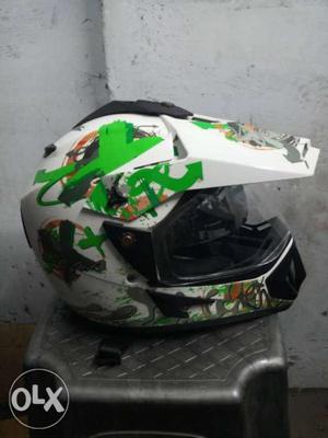 White, Green, And Black Full-face Helmet