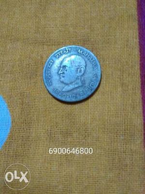 20 paisa Indian Round Silver-colored Mahatma Gandhi Coin