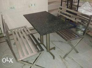 3 Tables with 6 Stainless steel benches.