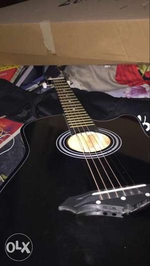 Achostic guitar in best condition along with a