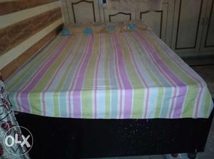 Bed along with matress, three years old.size of